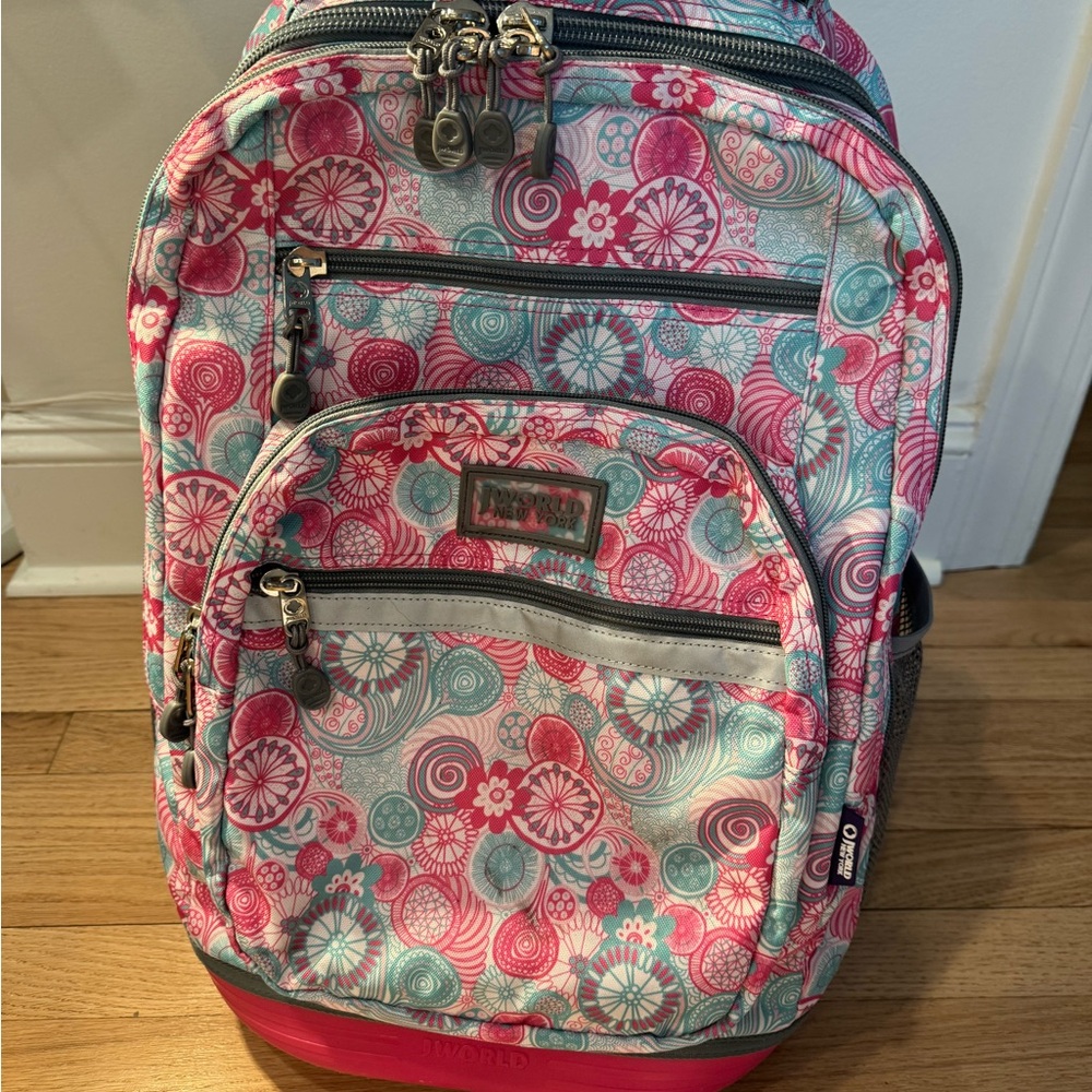 J World New York Pink and Blue Floral roller Backpack